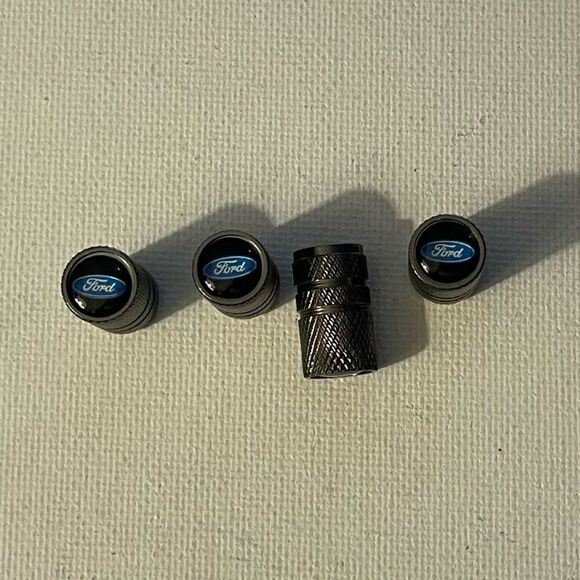 Ford valve Stem caps in Gray set of 4 NWT - Picture 1 of 4